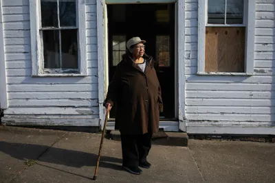Janis Ivory outside of the old town hall in  Rendville, OH where she grew up. Janis, her brother Harry and others are working to revitalize the old coal town.
